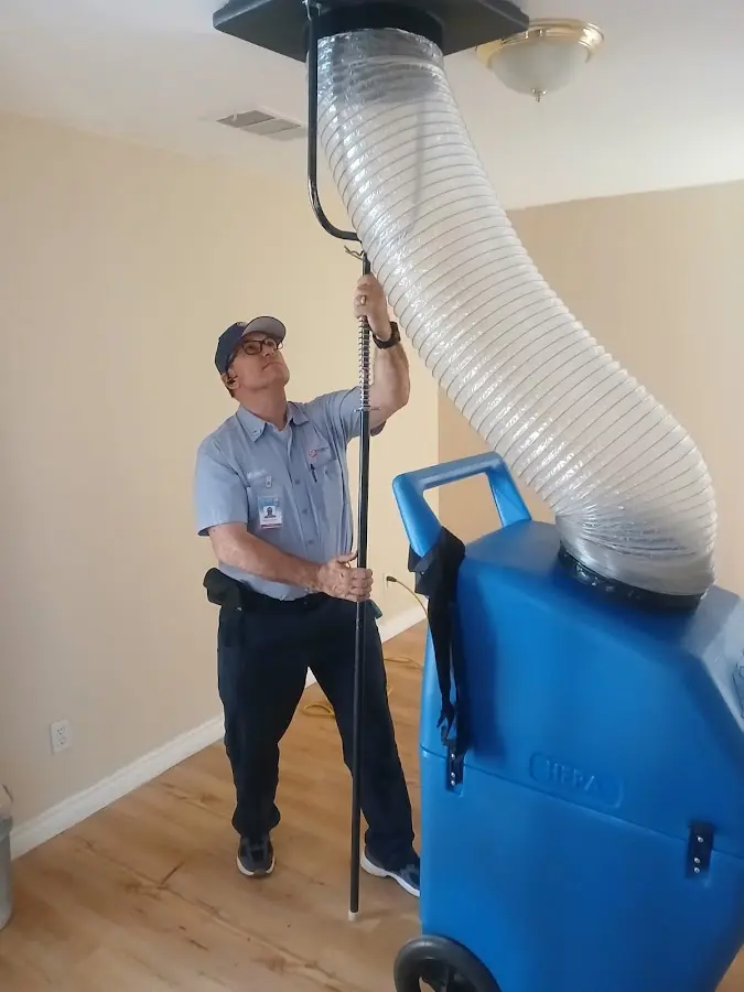 HVAC Installation technician using HEPA equipment in Cannon